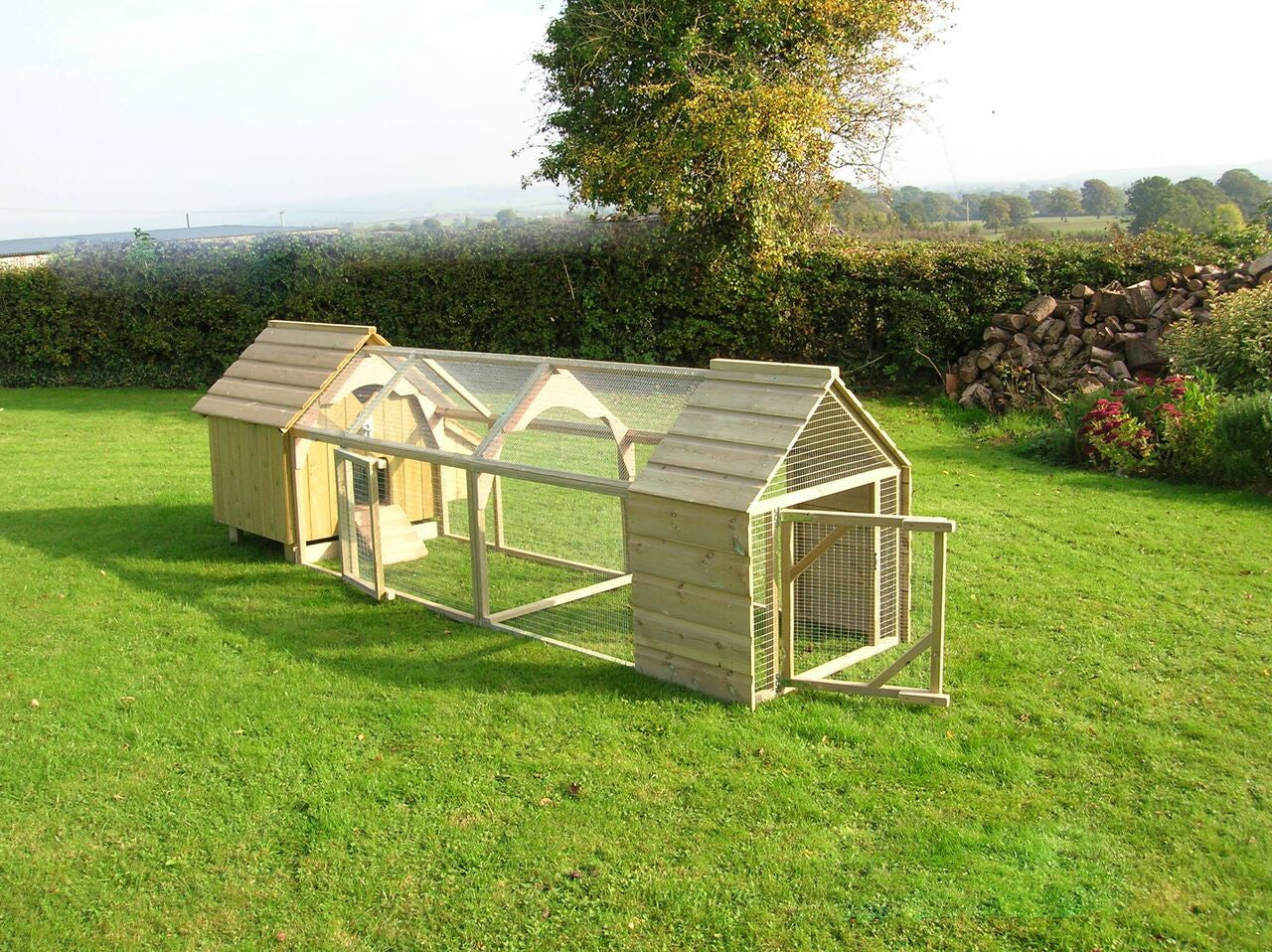 wooden chicken coop with run with sheltered end